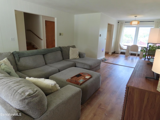 19 Grandview Ter, Adams, MA 01220 - living area featuring wood finished floors, stairway, and baseboards