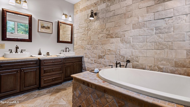 56 Crooked Hill Rd, Alford, MA 01230 - bathroom with a garden tub, stone tile floors, and double vanity