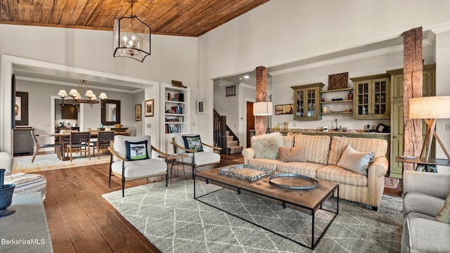 56 Crooked Hill Rd, Alford, MA 01230 - living room featuring a chandelier, wooden ceiling, dark wood-type flooring, stairs, and a high ceiling