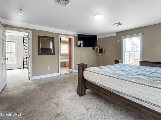 432 Grange Hall Rd, Dalton, MA 01226 - carpeted bedroom with multiple windows, baseboards, and connected bathroom