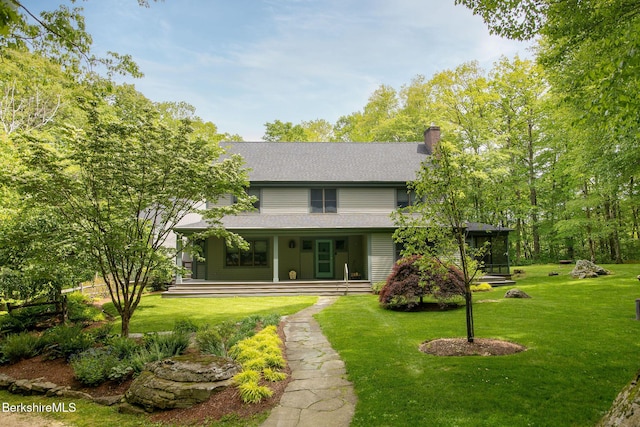 360 Brush Hill Rd, Sheffield, MA 01257 - back of property featuring a porch, a lawn, a chimney, and a shingled roof