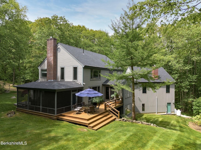 360 Brush Hill Rd, Sheffield, MA 01257 - back of house with a chimney, a sunroom, a deck, and a lawn