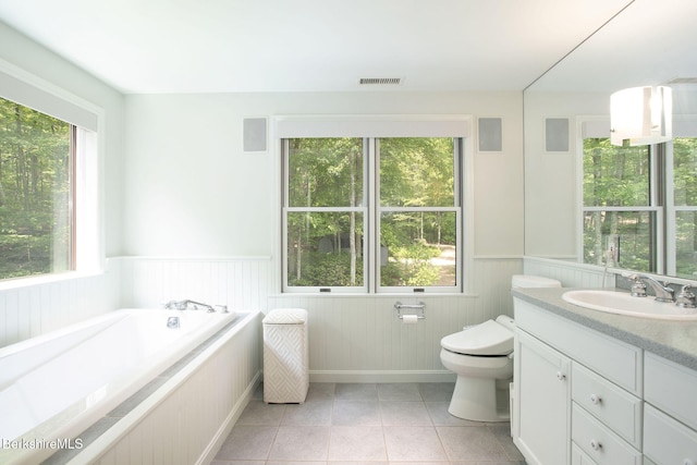 360 Brush Hill Rd, Sheffield, MA 01257 - full bath with a wainscoted wall, healthy amount of natural light, vanity, a garden tub, and tile patterned floors