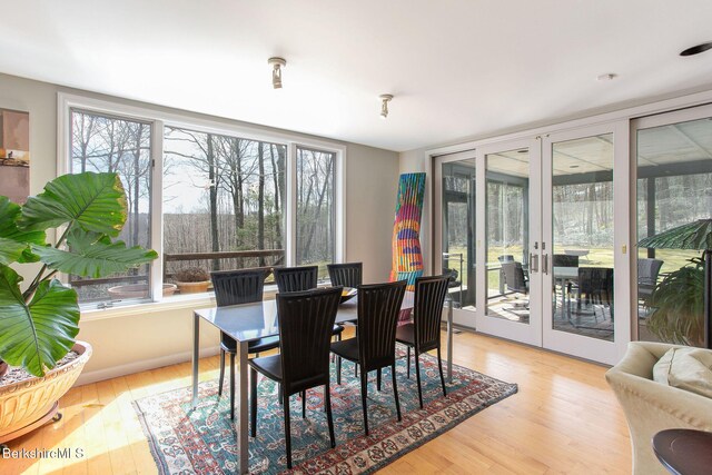 360 Brush Hill Rd, Sheffield, MA 01257 - dining room with french doors and wood finished floors