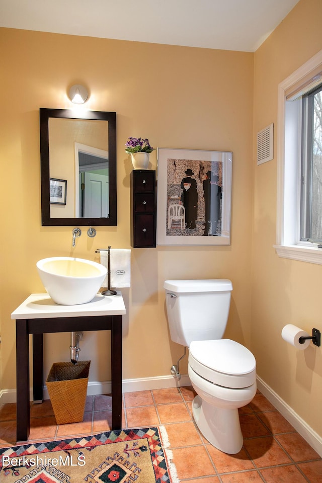 360 Brush Hill Rd, Sheffield, MA 01257 - bathroom featuring a sink, toilet, baseboards, and tile patterned flooring