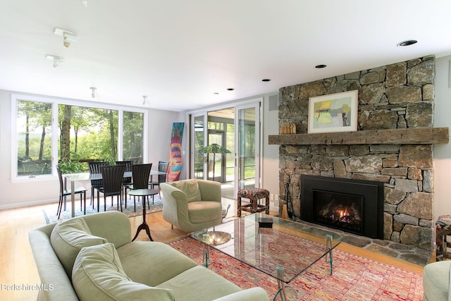 360 Brush Hill Rd, Sheffield, MA 01257 - living room with wood finished floors and a stone fireplace