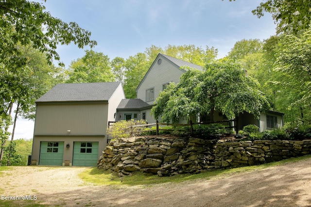 360 Brush Hill Rd, Sheffield, MA 01257 - view of front facade featuring dirt driveway and an attached garage