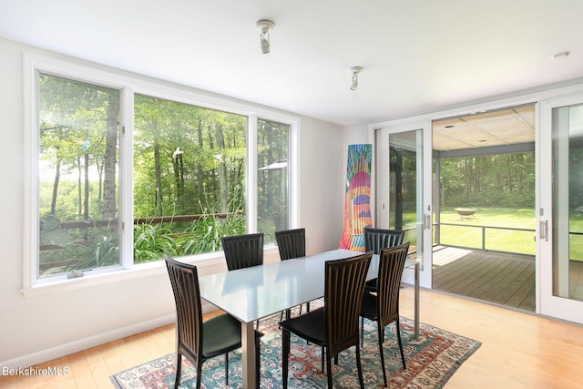360 Brush Hill Rd, Sheffield, MA 01257 - dining area featuring healthy amount of natural light, light wood-type flooring, and baseboards