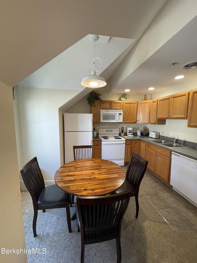 dining space featuring sink