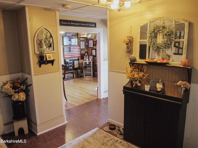 24 Turners Ave, Adams, MA 01220 - hall with wood finished floors, wainscoting, and a chandelier
