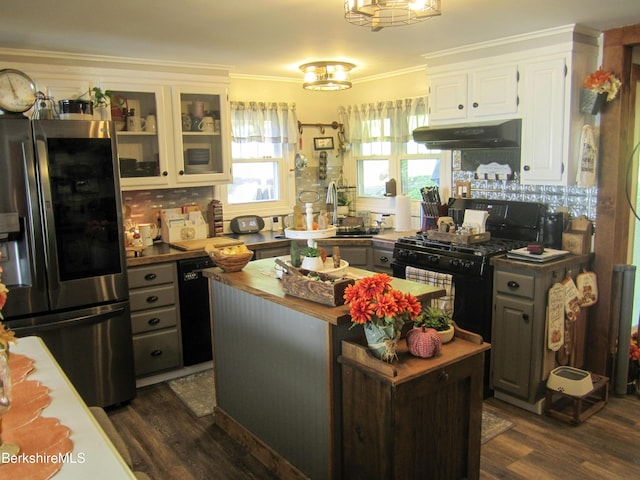 24 Turners Ave, Adams, MA 01220 - kitchen featuring black appliances, under cabinet range hood, butcher block counters, dark wood-type flooring, and crown molding