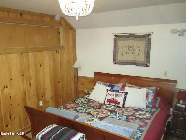 24 Turners Ave, Adams, MA 01220 - bedroom with wooden walls and a chandelier
