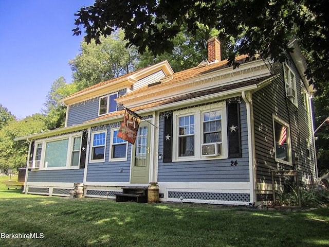 24 Turners Ave, Adams, MA 01220 - view of front of property with entry steps, a chimney, cooling unit, and a front lawn