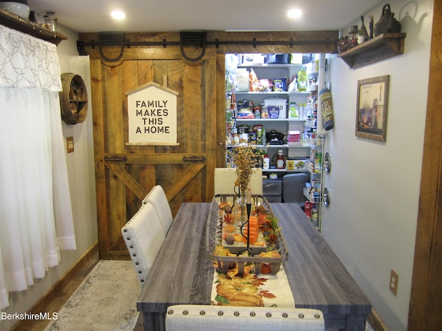 24 Turners Ave, Adams, MA 01220 - dining space with a barn door, wood finished floors, and recessed lighting