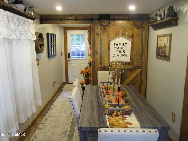 24 Turners Ave, Adams, MA 01220 - dining area with a barn door, wood finished floors, and recessed lighting