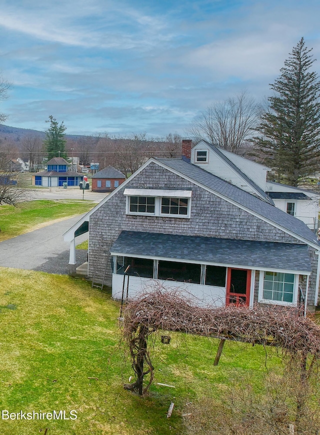 321 High St, Dalton, MA 01226 - view of side of property featuring a lawn, a shingled roof, and a chimney