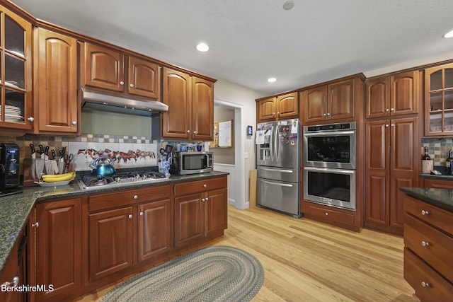 200 Easthampton Rd, Westhampton, MA 01027 - kitchen with stainless steel appliances, under cabinet range hood, light wood-style flooring, tasteful backsplash, and recessed lighting
