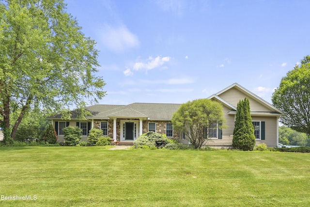 200 Easthampton Rd, Westhampton, MA 01027 - view of front of house with a front yard and stone siding
