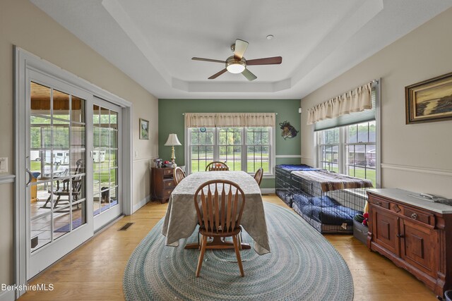 200 Easthampton Rd, Westhampton, MA 01027 - dining area with a tray ceiling, a ceiling fan, and light wood finished floors