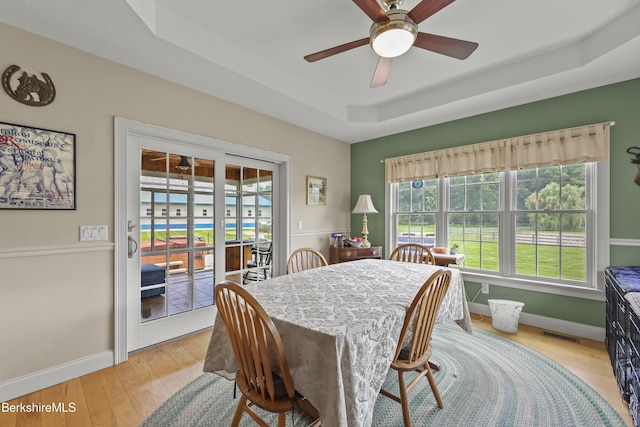 200 Easthampton Rd, Westhampton, MA 01027 - dining room with a raised ceiling, ceiling fan, and light wood-style flooring