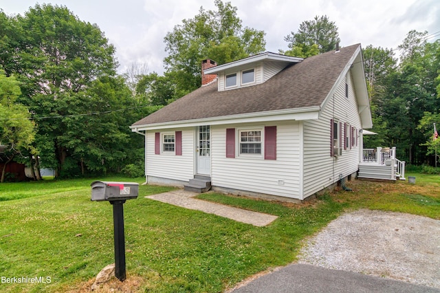 63 Yarmouth St, Pittsfield, MA 01201 - view of front of home featuring a chimney, a front yard, and roof with shingles