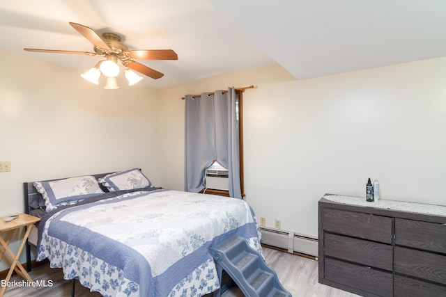 63 Yarmouth St, Pittsfield, MA 01201 - bedroom featuring baseboard heating, wood finished floors, and ceiling fan