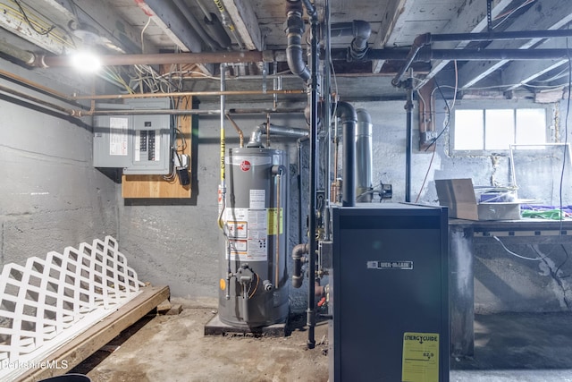 63 Yarmouth St, Pittsfield, MA 01201 - utility room featuring gas water heater, electric panel, and a heating unit