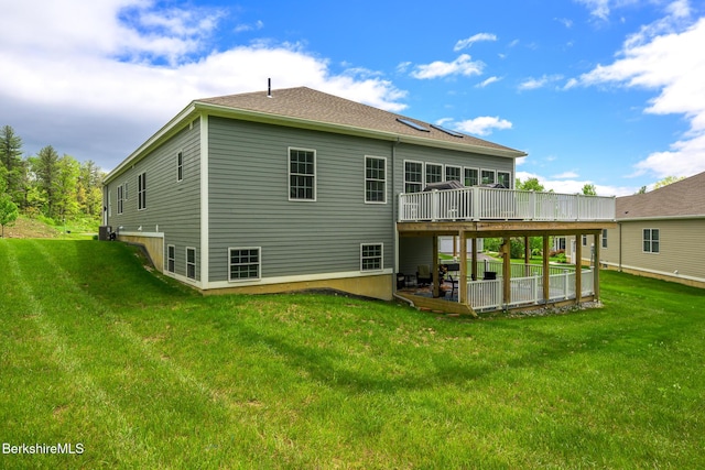 19 Aspen Way, Pittsfield, MA 01201 - rear view of house with a wooden deck, a yard, a patio area, and central AC