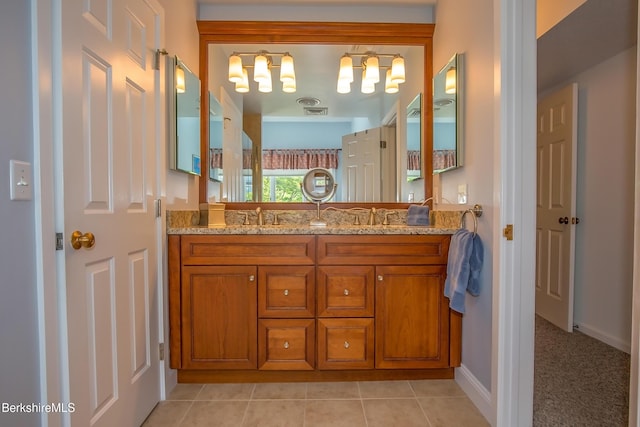770 Summer St Unit 5D, Lee, MA 01238 - bathroom featuring double vanity, baseboards, and tile patterned flooring