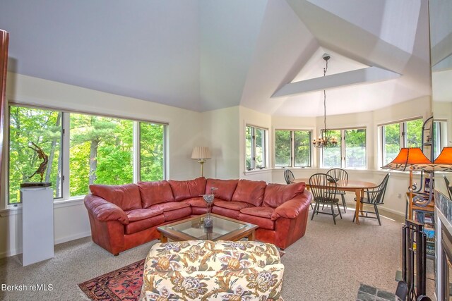 770 Summer St Unit 5D, Lee, MA 01238 - living room with high vaulted ceiling, a chandelier, carpet flooring, and baseboards