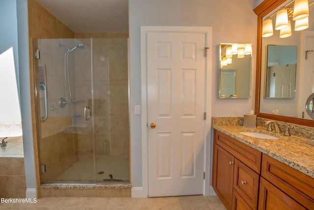 770 Summer St Unit 5D, Lee, MA 01238 - bathroom with vanity, tile patterned flooring, and a stall shower