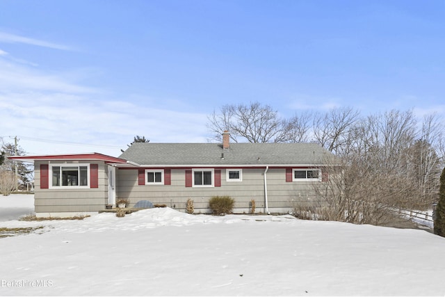 view of front of property with a chimney