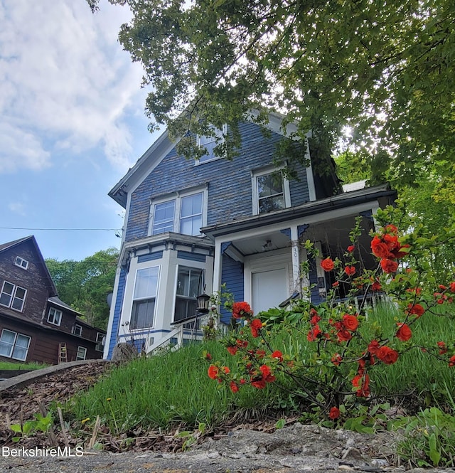 301 Walnut St, North Adams, MA 01247 - view of front facade featuring a porch