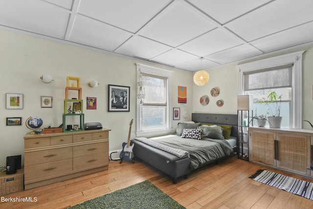 bedroom with light wood-type flooring