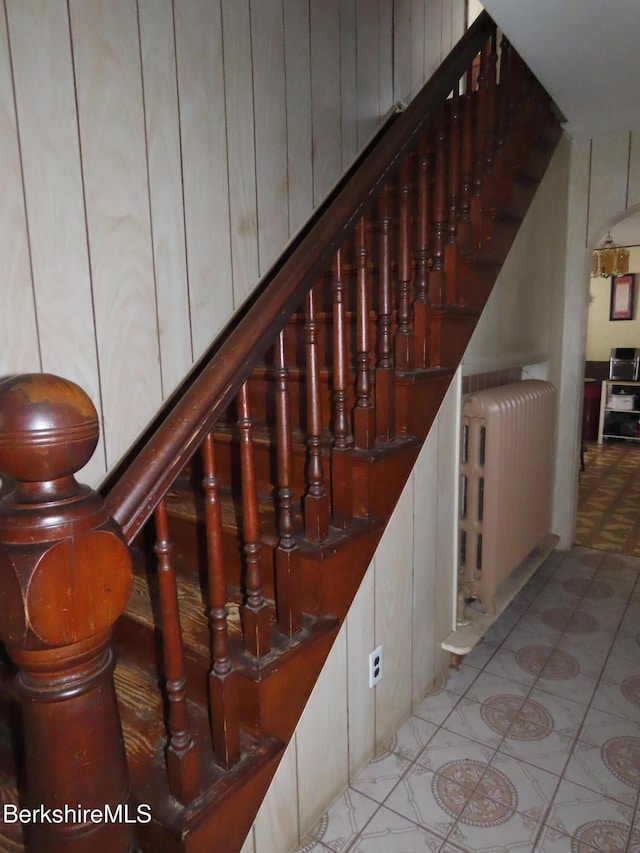 staircase with radiator heating unit