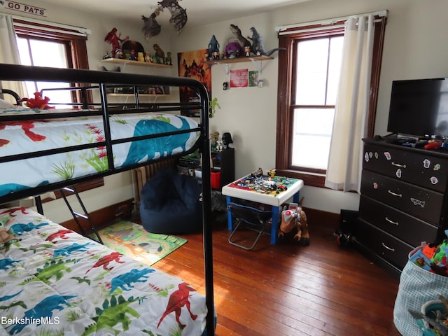 bedroom featuring wood-type flooring