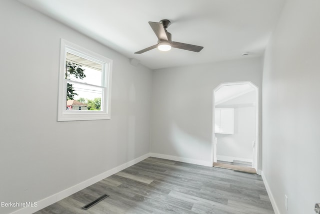3 Burke Ave, Pittsfield, MA 01201 - spare room featuring wood finished floors, a ceiling fan, and arched walkways