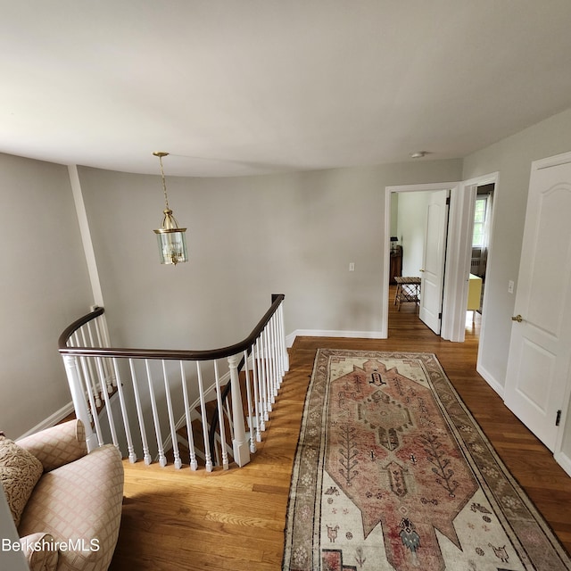 377 Pomeroy Ave, Pittsfield, MA 01201 - hall with wood finished floors and an upstairs landing