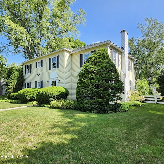 377 Pomeroy Ave, Pittsfield, MA 01201 - view of side of home with a chimney and a yard