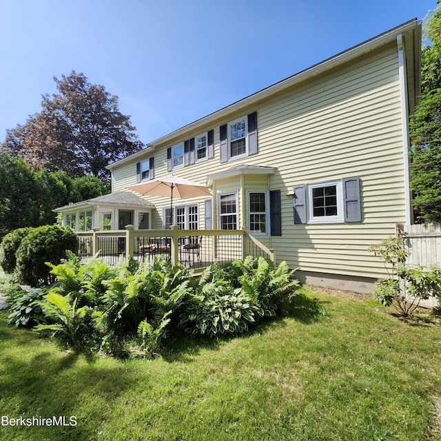 377 Pomeroy Ave, Pittsfield, MA 01201 - rear view of house featuring a wooden deck and a lawn