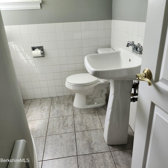 377 Pomeroy Ave, Pittsfield, MA 01201 - bathroom featuring tile walls and tile patterned flooring