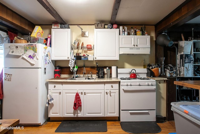 53 Mahaiwe St, Great Barrington, MA 01230 - kitchen featuring white appliances, under cabinet range hood, and white cabinetry