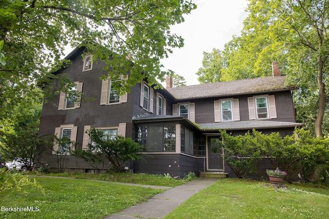 53 Mahaiwe St, Great Barrington, MA 01230 - view of front of house featuring a chimney and a front yard