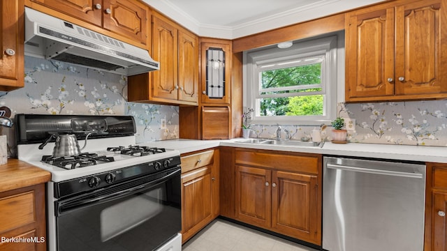 22 Delafield Dr, Lenox, MA 01240 - kitchen featuring range with gas stovetop, dishwasher, under cabinet range hood, and brown cabinetry