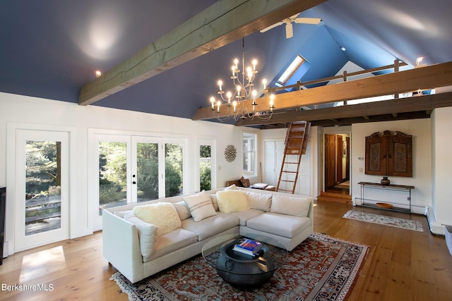 living room featuring a skylight, ceiling fan with notable chandelier, hardwood / wood-style flooring, high vaulted ceiling, and beamed ceiling