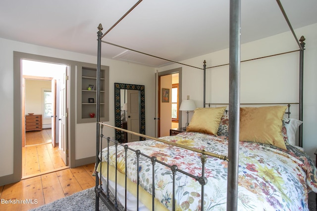 bedroom with light hardwood / wood-style floors