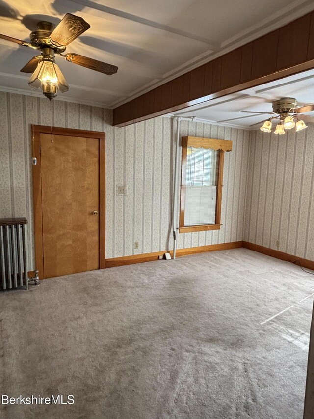 31 Millard Ave, Clarksburg, MA 01247 - carpeted spare room with wallpapered walls and ceiling fan