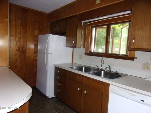 31 Millard Ave, Clarksburg, MA 01247 - kitchen with white appliances, light countertops, wood walls, and brown cabinets