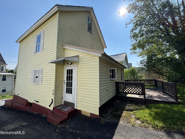 31 Millard Ave, Clarksburg, MA 01247 - back of house featuring crawl space and a wooden deck