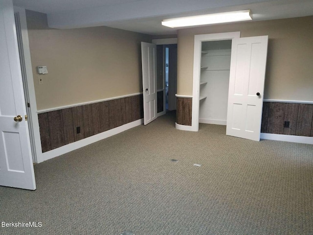 406 Main St, Great Barrington, MA 01230 - unfurnished bedroom with carpet, baseboards, and wainscoting